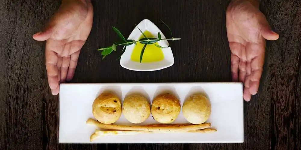 The Locanda del Capitano Restaurant in Montone, led by Chef Giancarlo Polito. Fresh homemade bread is prepared daily. Umbria, Perugia, Italy